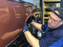 The Dent Guy working on a 1957 Chevy Belair